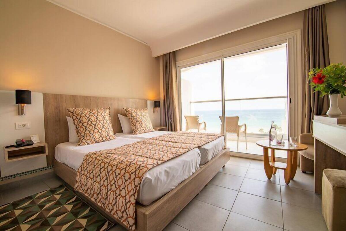 Standard Single Room, Sea View | Minibar, in-room safe, blackout curtains, free WiFi