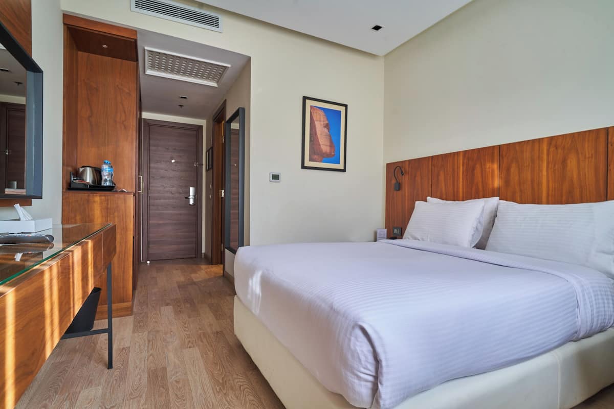 Singola Deluxe | 2 camere, minibar, una cassaforte in camera, una scrivania