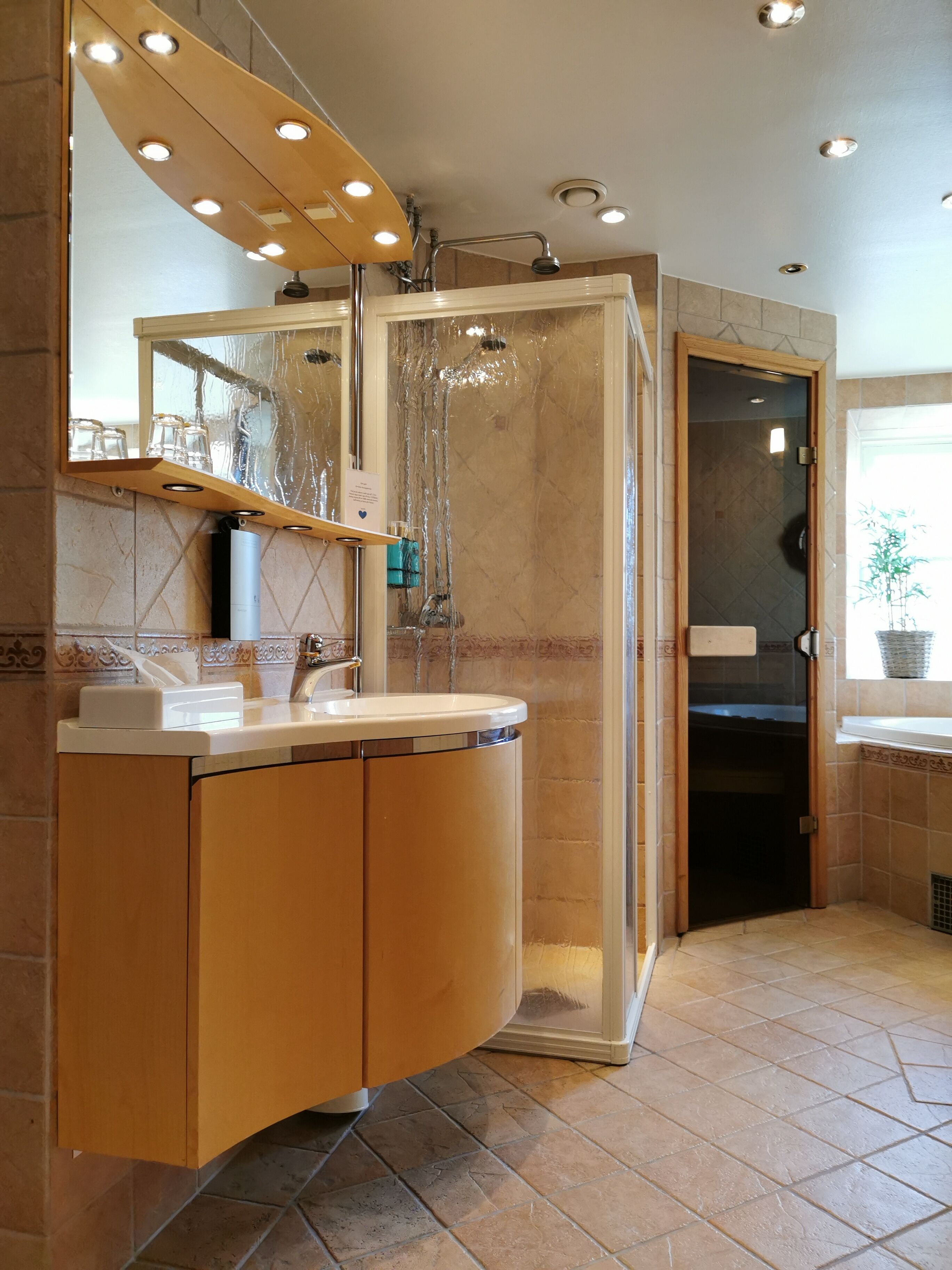 Suite, 1 King Bed, Non Smoking, Jetted Tub | Bathroom | Shower, towels, soap, shampoo