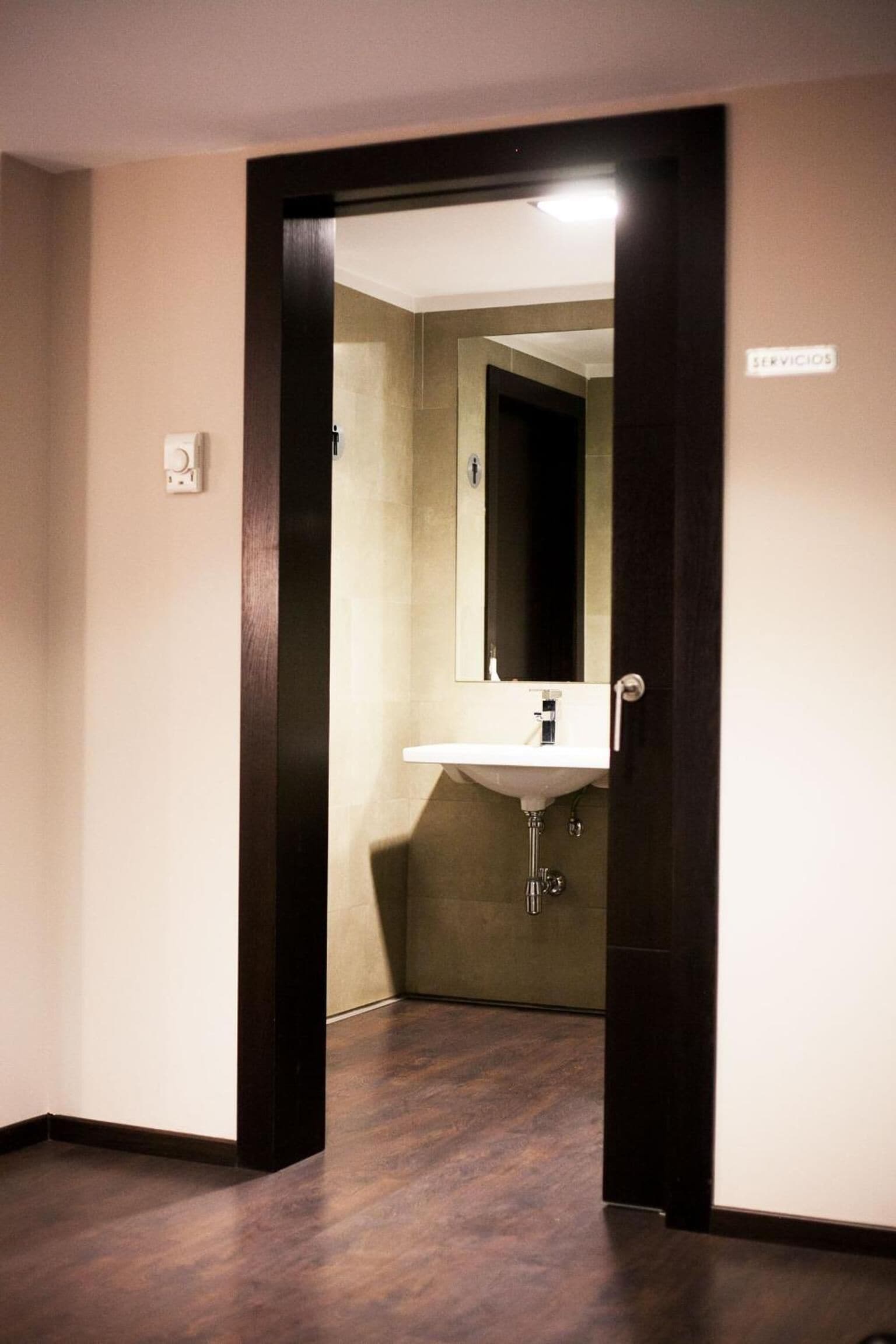 bathtub, hair dryer, bidet, towels