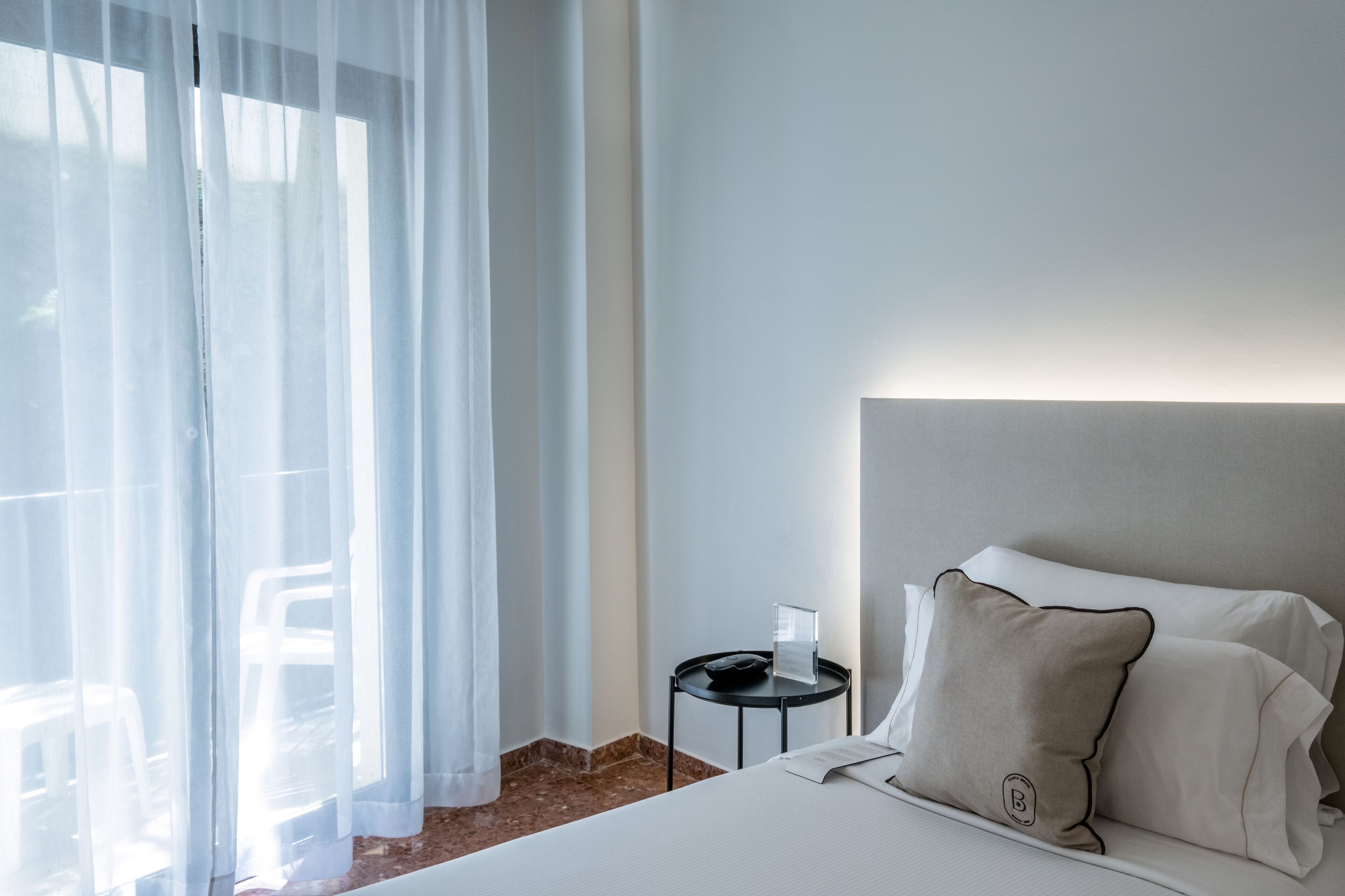 economy double room | in-room safe, desk, blackout curtains, iron/ironing board