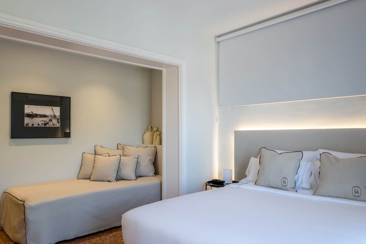 standard triple room | in-room safe, desk, blackout curtains, iron/ironing board