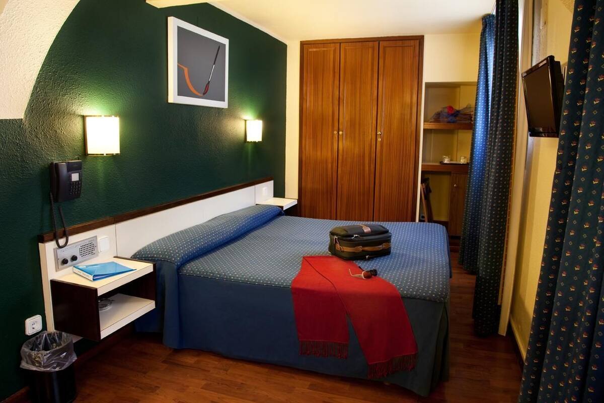Dobbeltrom for 1 person | Minibar, safe på rommet, blendingsgardiner og barnesenger (inkludert)