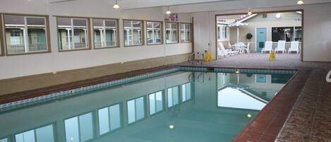Indoor pool, a heated pool, open 8:30 AM to 9:30 PM, sun loungers
