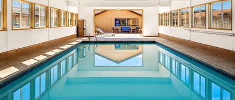 Indoor pool, a heated pool, open 8:30 AM to 9:30 PM, sun loungers