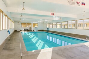 Indoor pool, a heated pool, open 8:30 AM to 9:30 PM, pool loungers