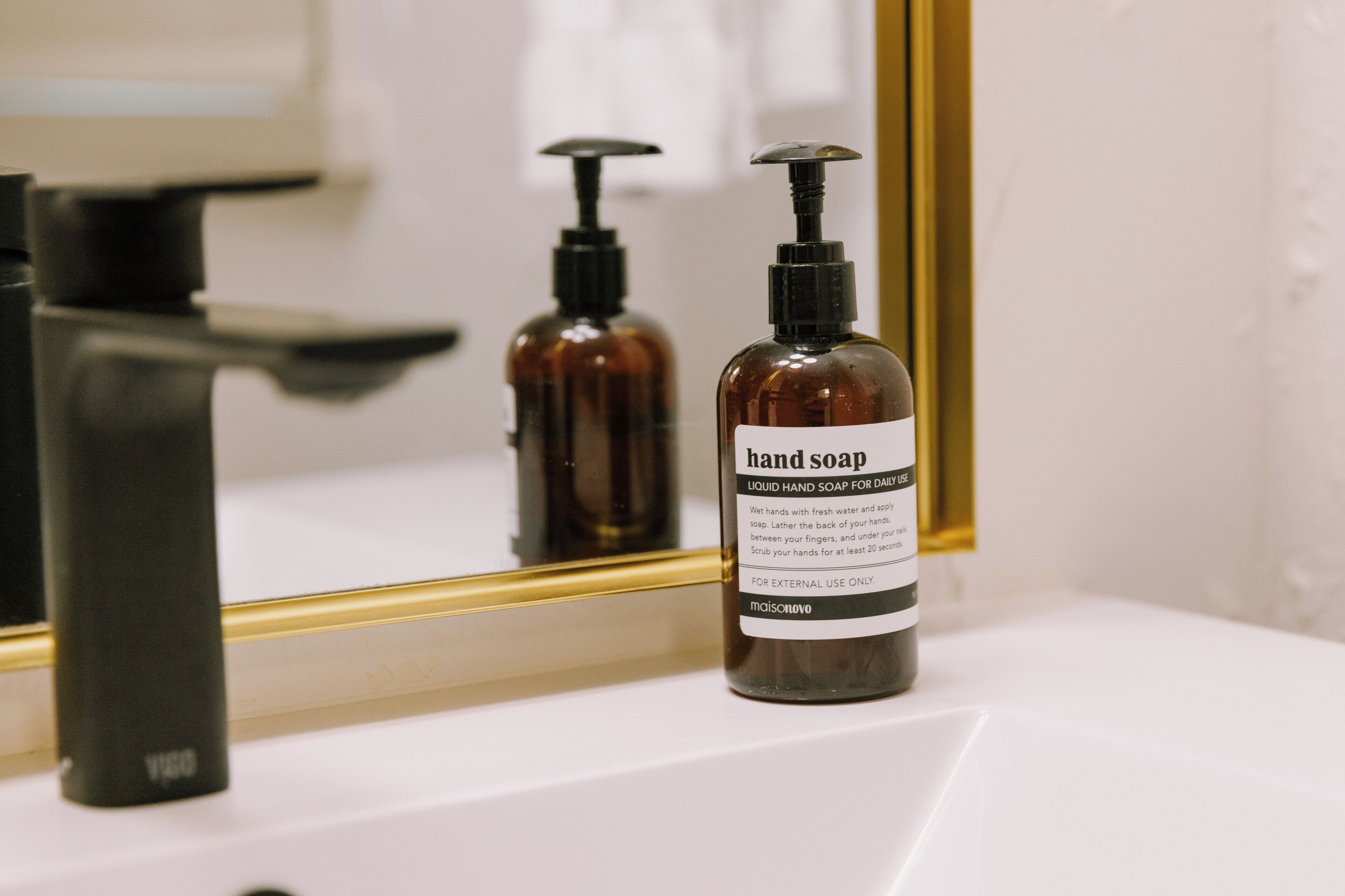 hair dryer, slippers, towels, soap