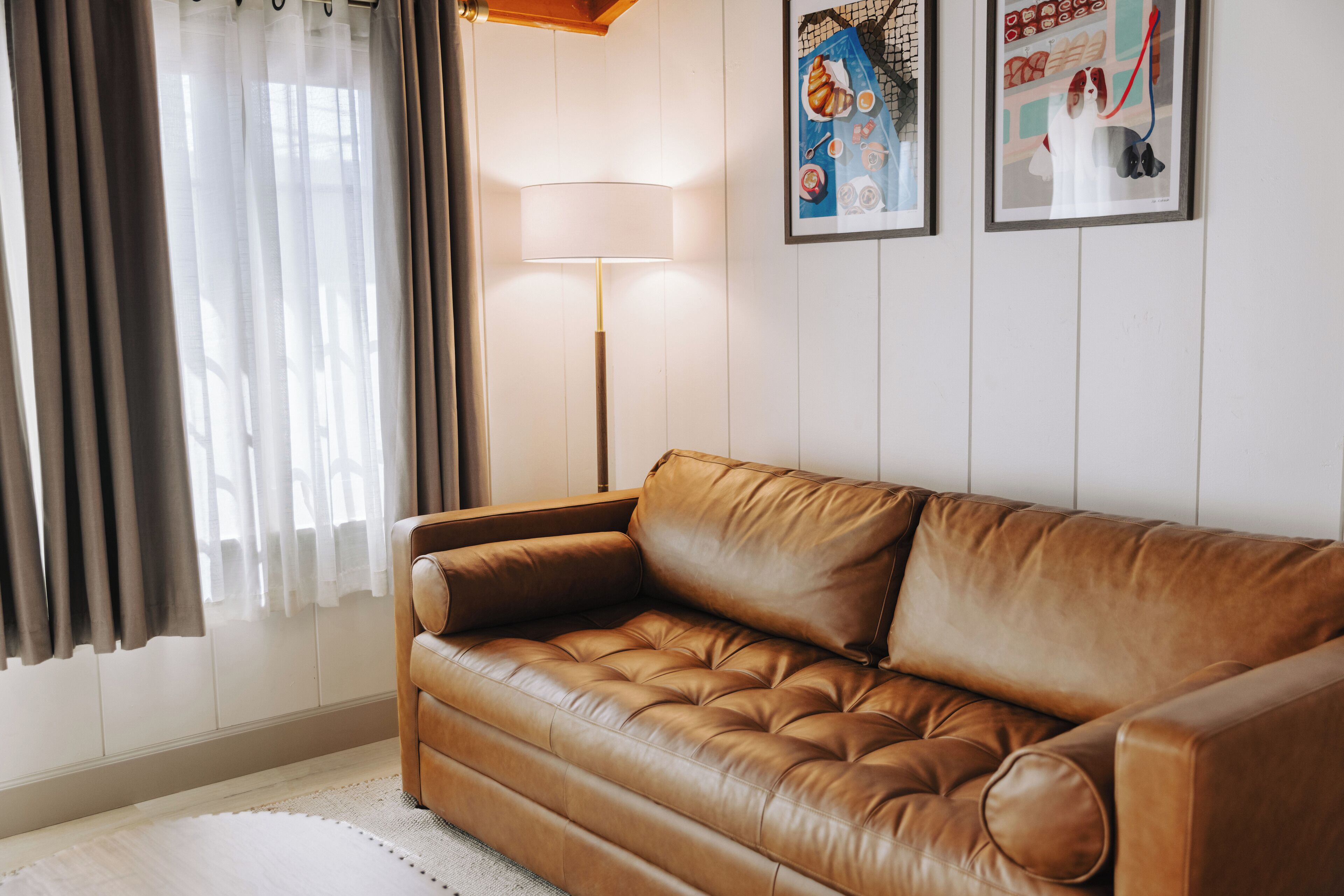 hygge courtyard suite | living area | 42-inch flat-screen tv with cable channels, tv