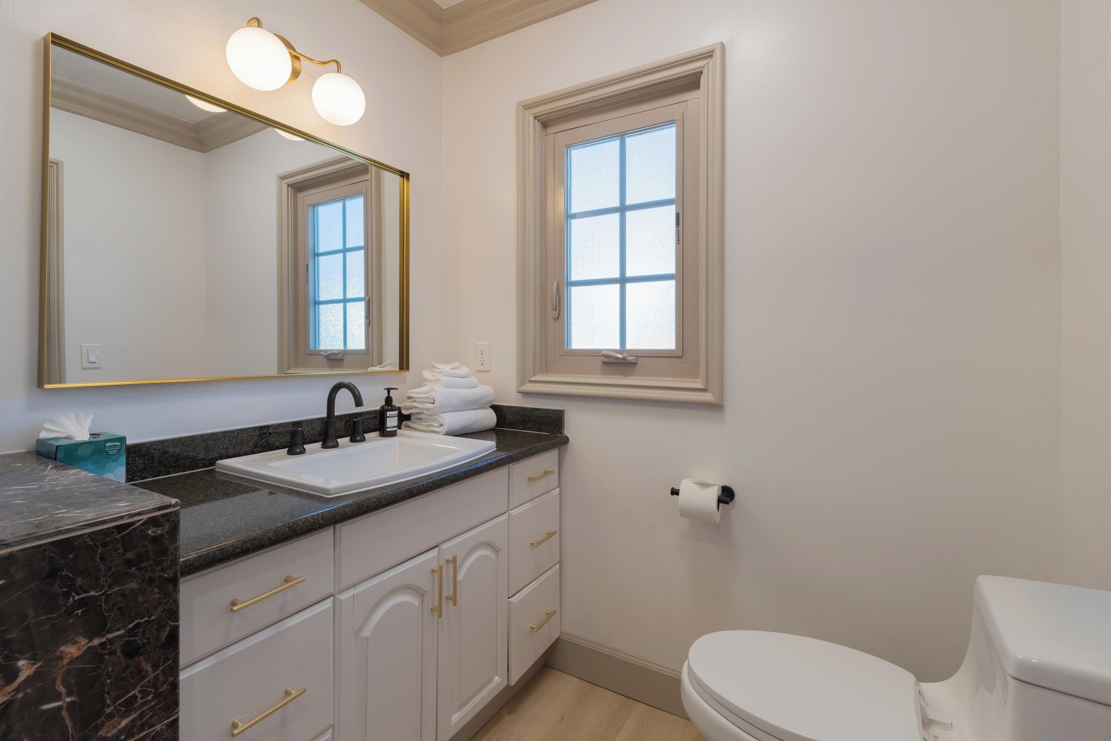 skagen sol king | bathroom | hair dryer, slippers, towels, soap