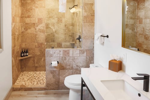 Hair dryer, slippers, towels, soap