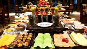A buffet with various food items and drinks. - Peermont D'oreale Grande at Emperors Palace (Kempton Park)