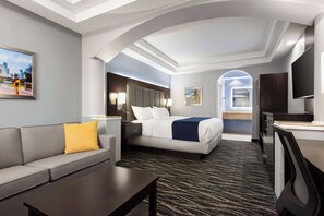 1 King Bed Suite, Non-Smoking | Egyptian cotton sheets, premium bedding, down comforters, pillowtop beds - Days Inn & Suites by Wyndham Houston Hobby Airport (Houston)