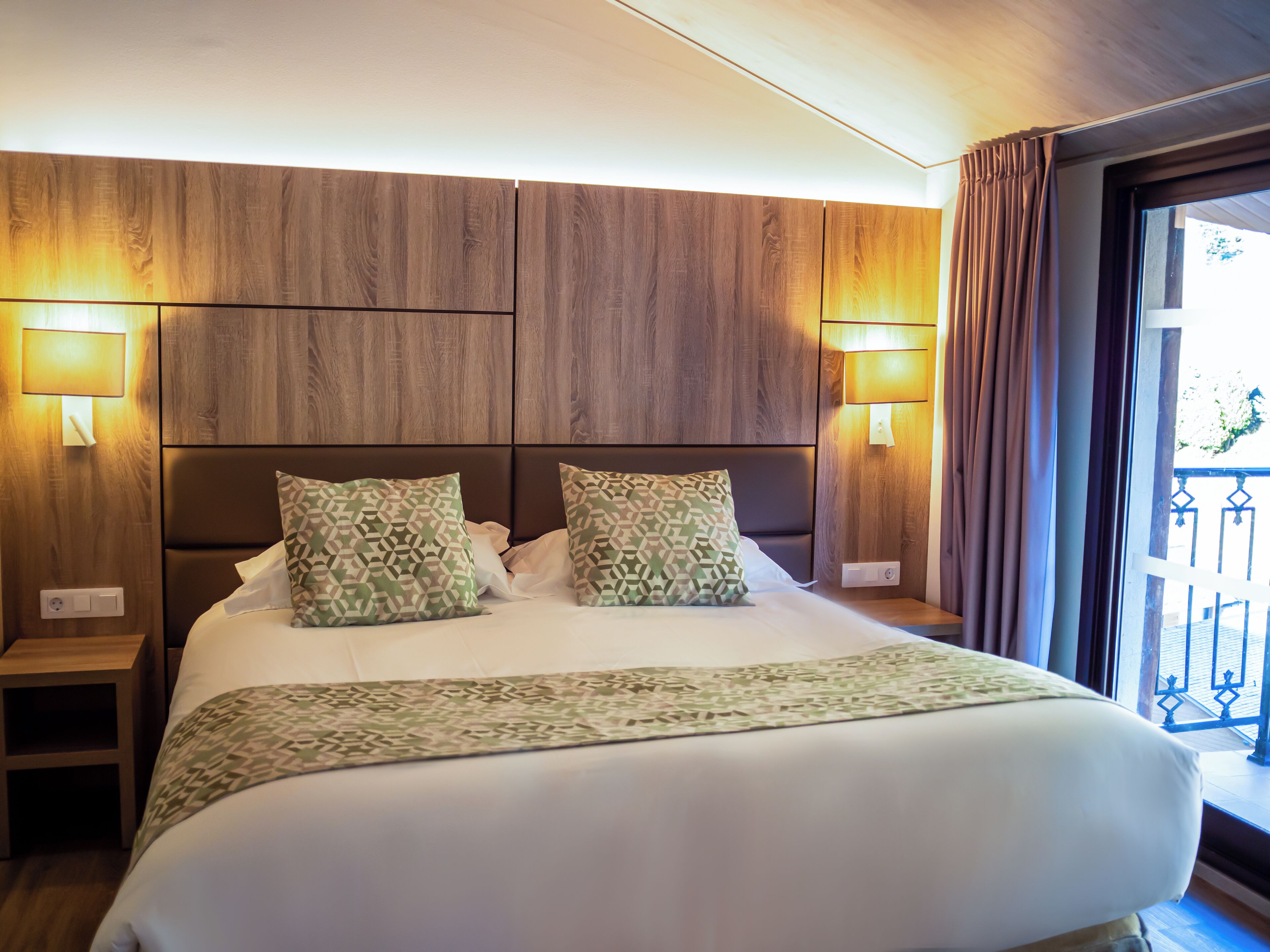 Premium bedding, down comforters, in-room safe, desk