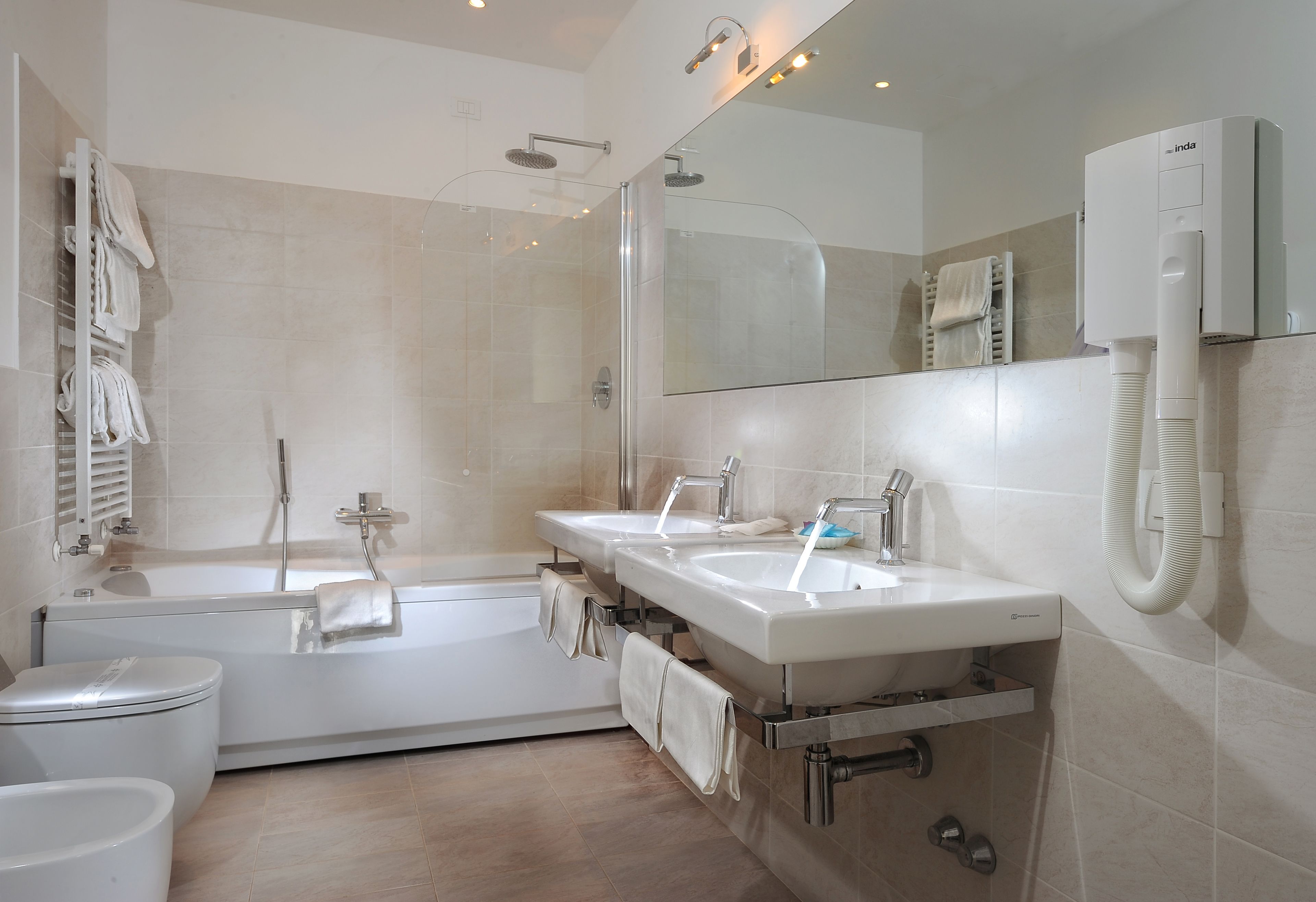 free toiletries, hair dryer, bidet, towels