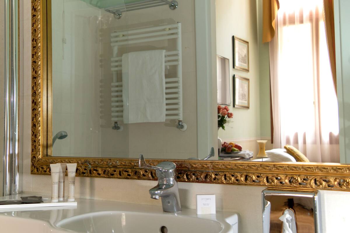 free toiletries, hair dryer, bidet, towels