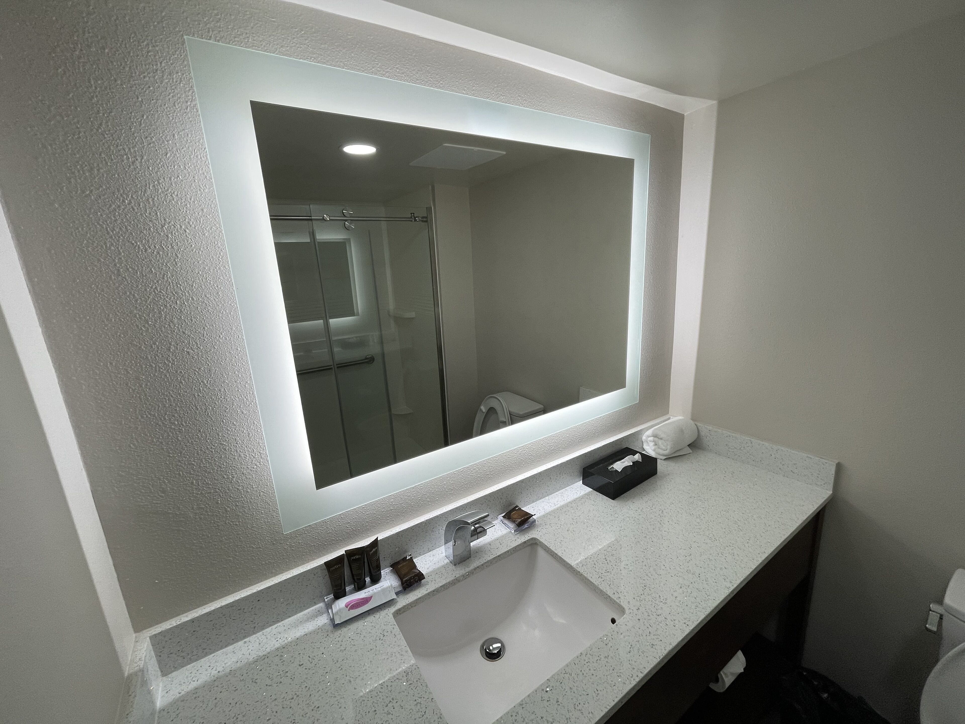 shower, free toiletries, hair dryer, towels