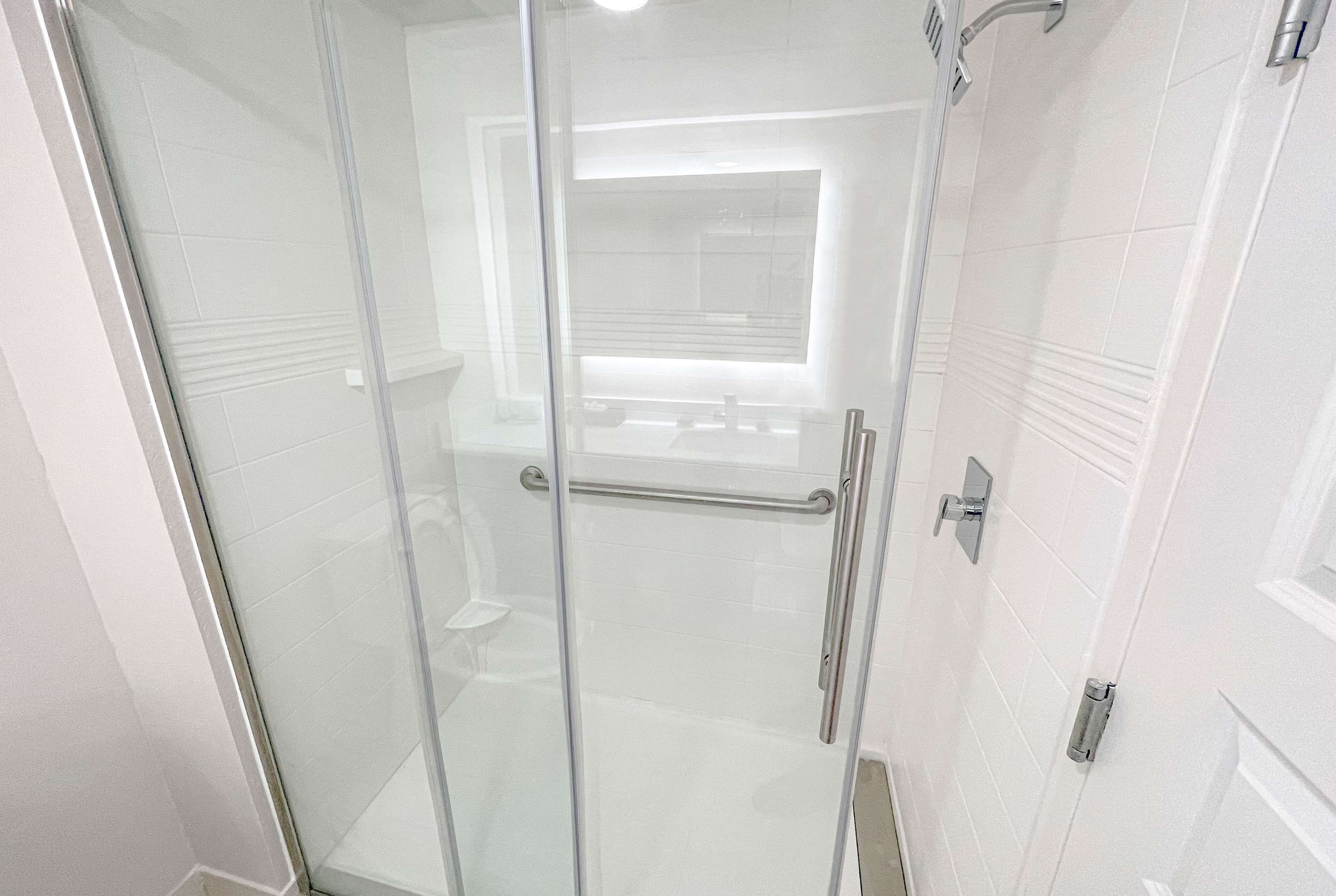 shower, free toiletries, hair dryer, towels