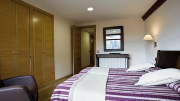 Quadruple Room, Garden View | Premium bedding, in-room safe, desk, blackout drapes