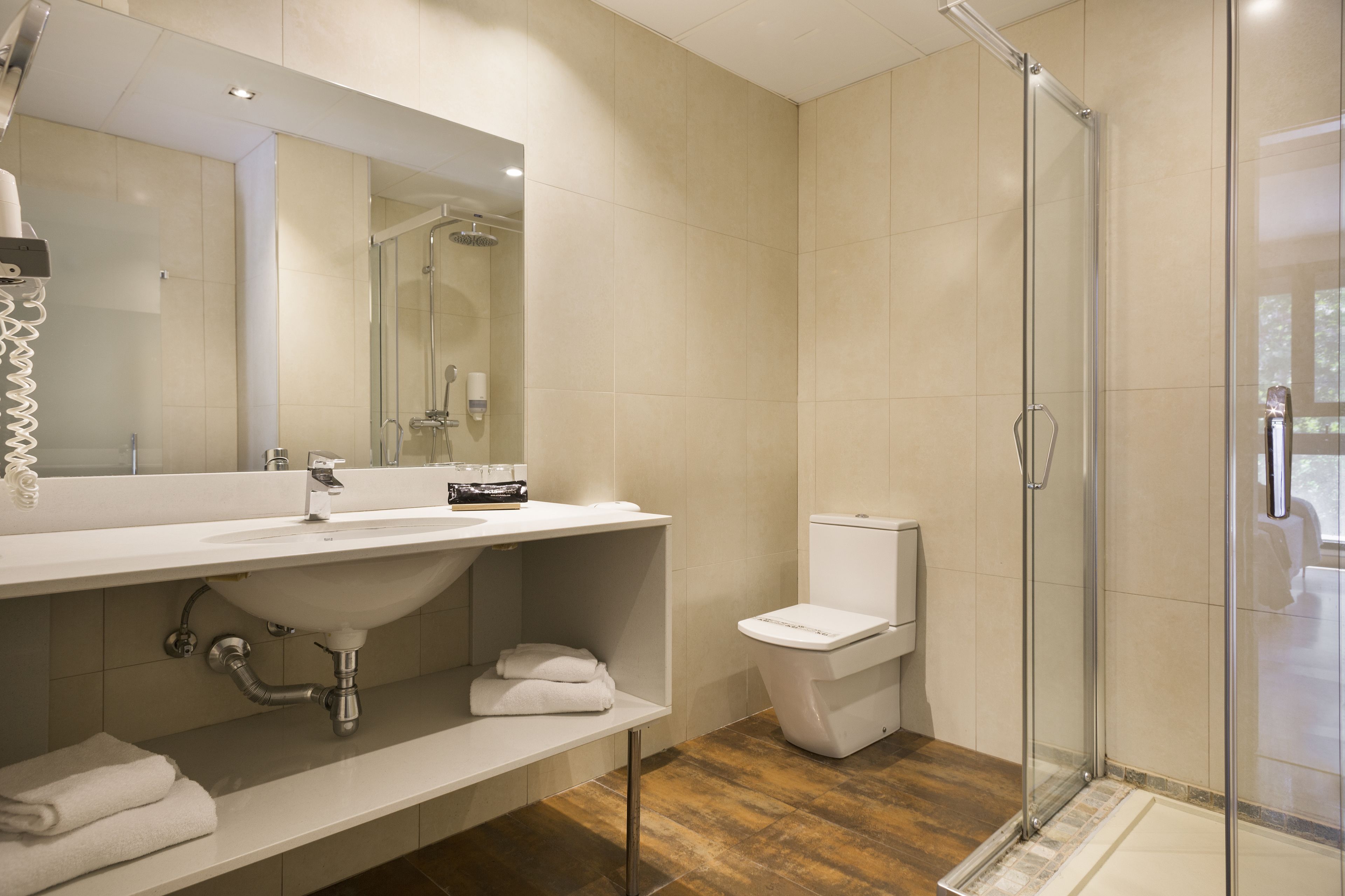 free toiletries, hair dryer, towels, soap