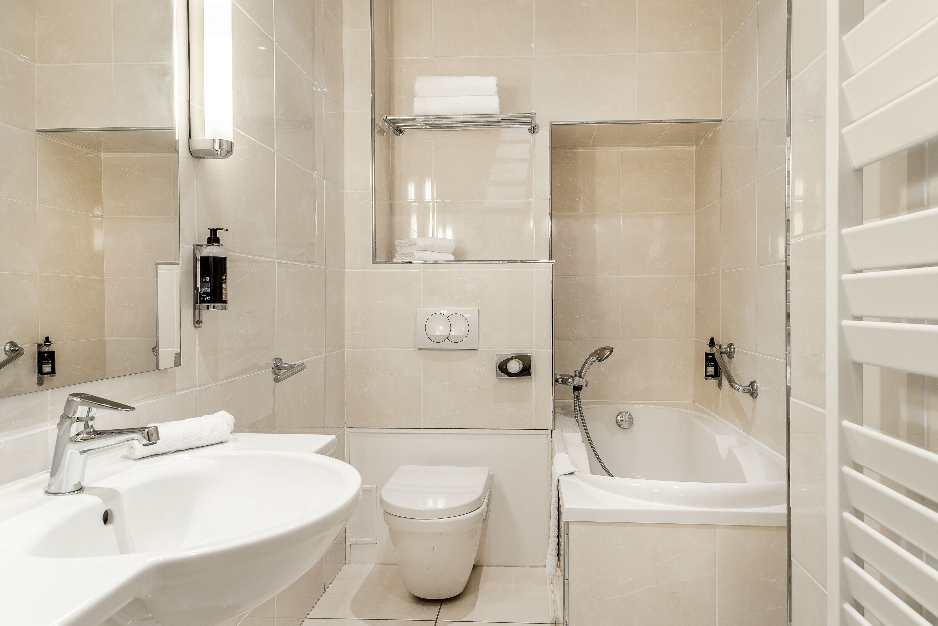 combined shower/bathtub, free toiletries, hair dryer, towels