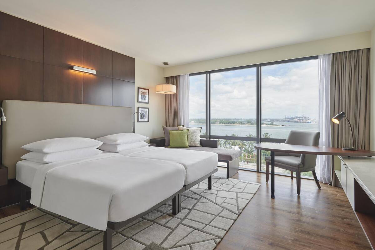 room, 2 single beds, sea view | minibar, in-room safe, desk, soundproofing