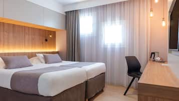 Habitación estándar, 2 camas individuales | Ropa de cama de alta calidad y caja de seguridad en la habitación