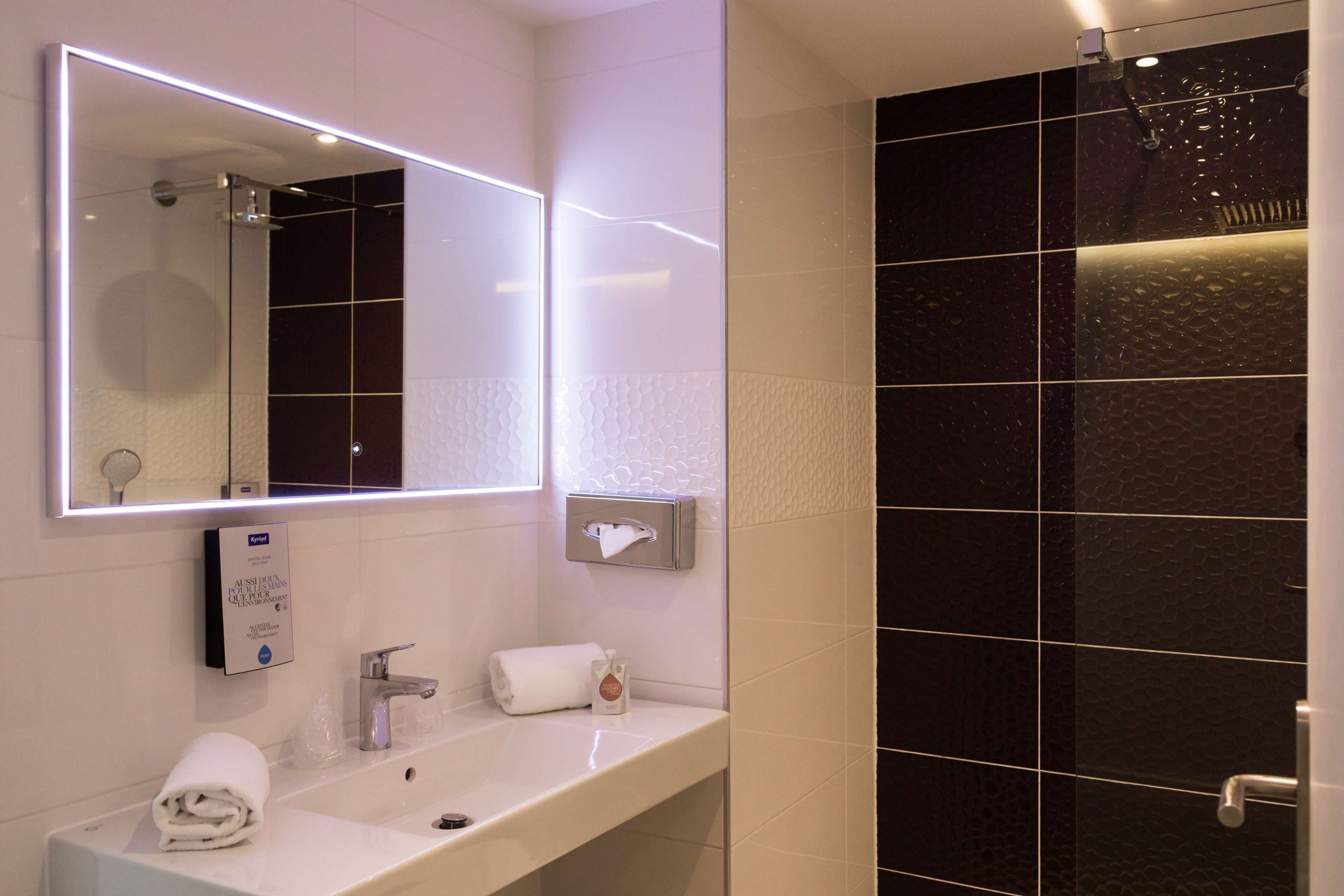 superior room, 1 queen bed | bathroom | eco-friendly toiletries, hair dryer, towels