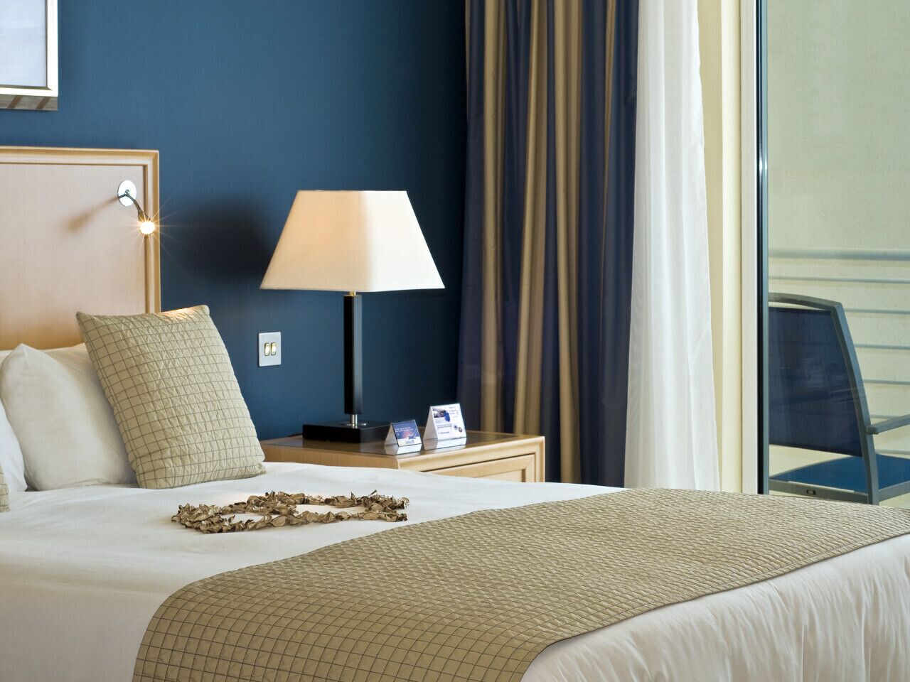 Hypo-allergenic bedding, minibar, in-room safe, desk
