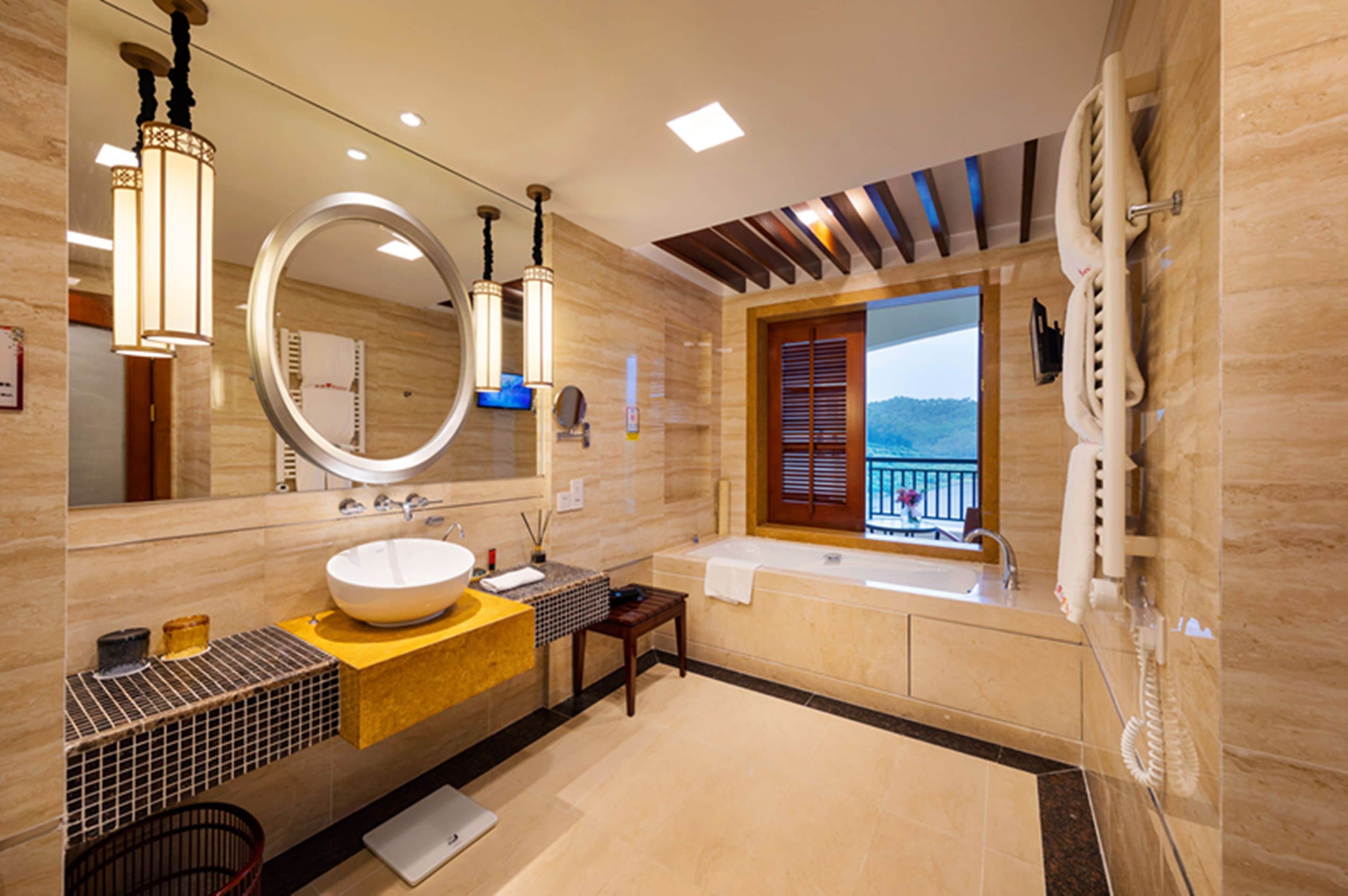 separate bathtub and shower, rainfall showerhead, designer toiletries