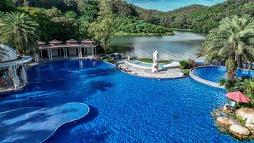 Indoor pool, seasonal outdoor pool, pool umbrellas, pool loungers