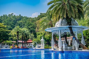 Indoor pool, seasonal outdoor pool, pool umbrellas, pool loungers