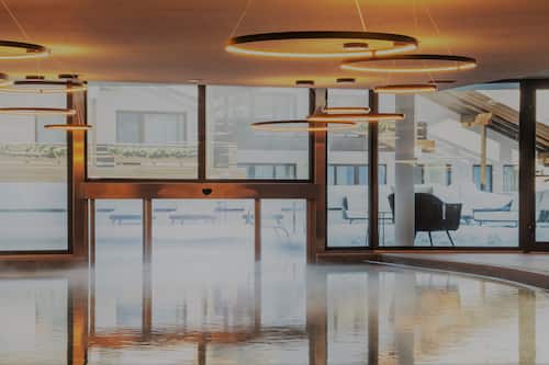 Indoor pool, seasonal outdoor pool, pool umbrellas, sun loungers