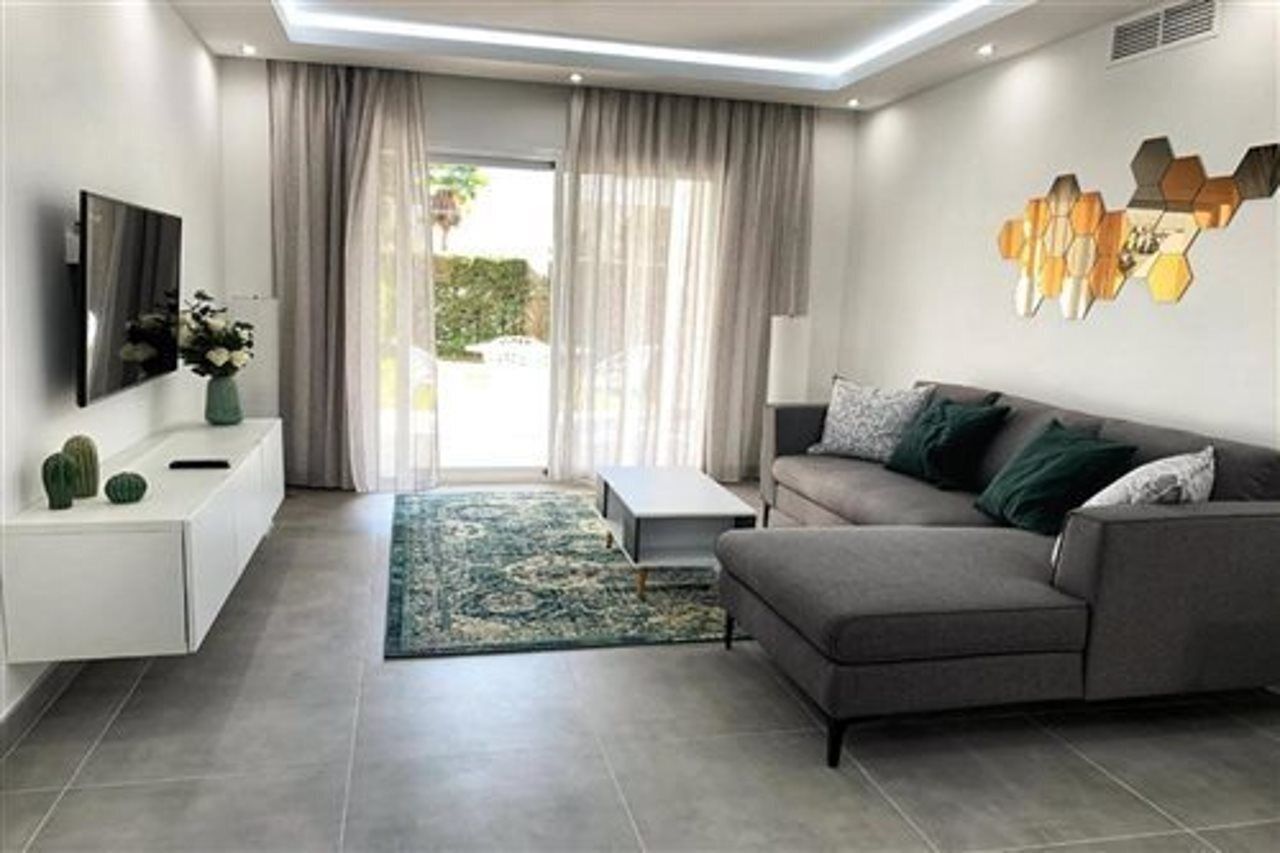 32-inch flat-screen TV with satellite channels, TV