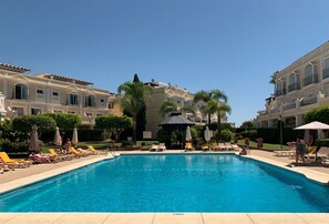 3 outdoor pools, open 9:00 AM to 9:00 PM, pool umbrellas, pool loungers
