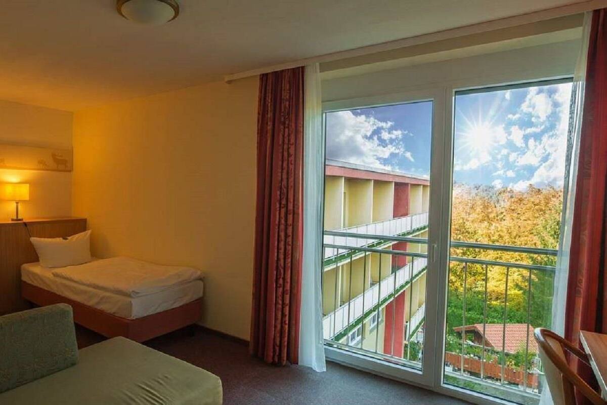 hypo-allergenic bedding, desk, blackout curtains, soundproofing