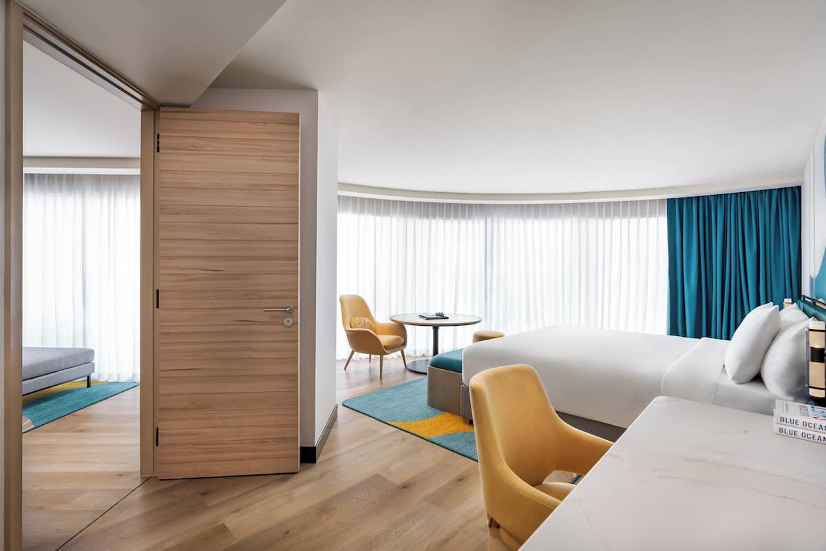 Suite (Trendy, Afterglow) | In-room safe, desk, blackout drapes, iron/ironing board