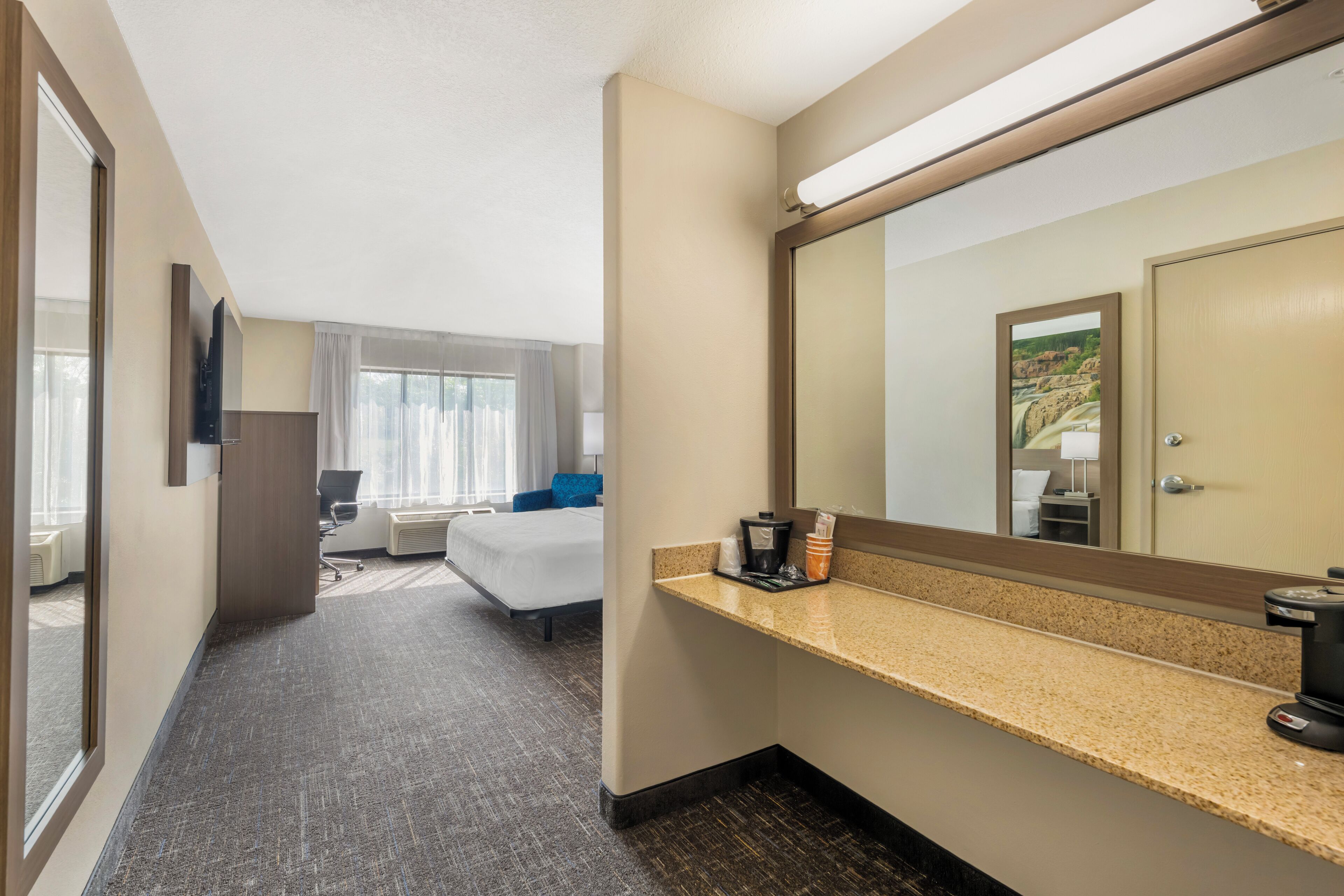 desk, blackout curtains, iron/ironing board, free cots/infant beds