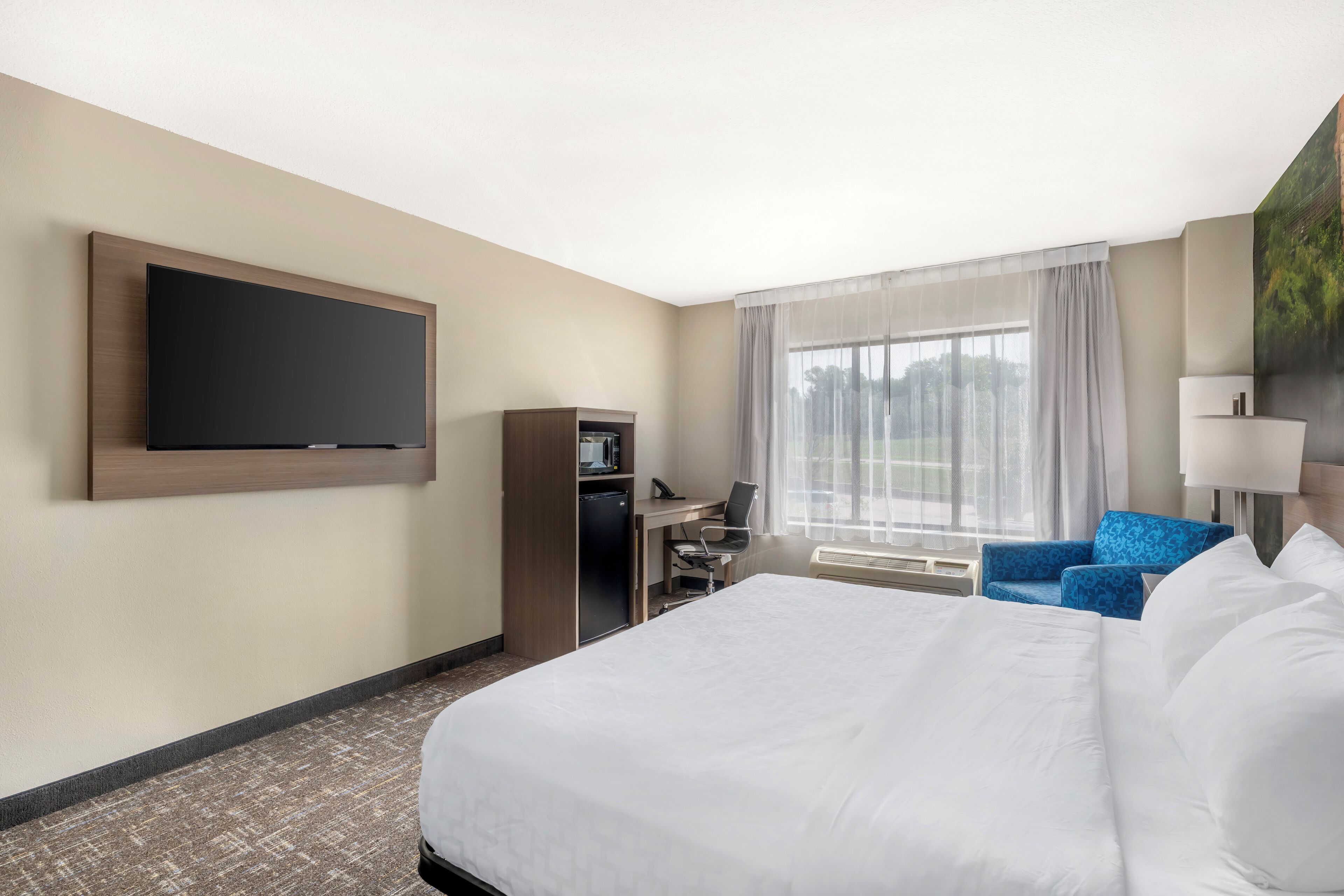 desk, blackout curtains, iron/ironing board, free cots/infant beds