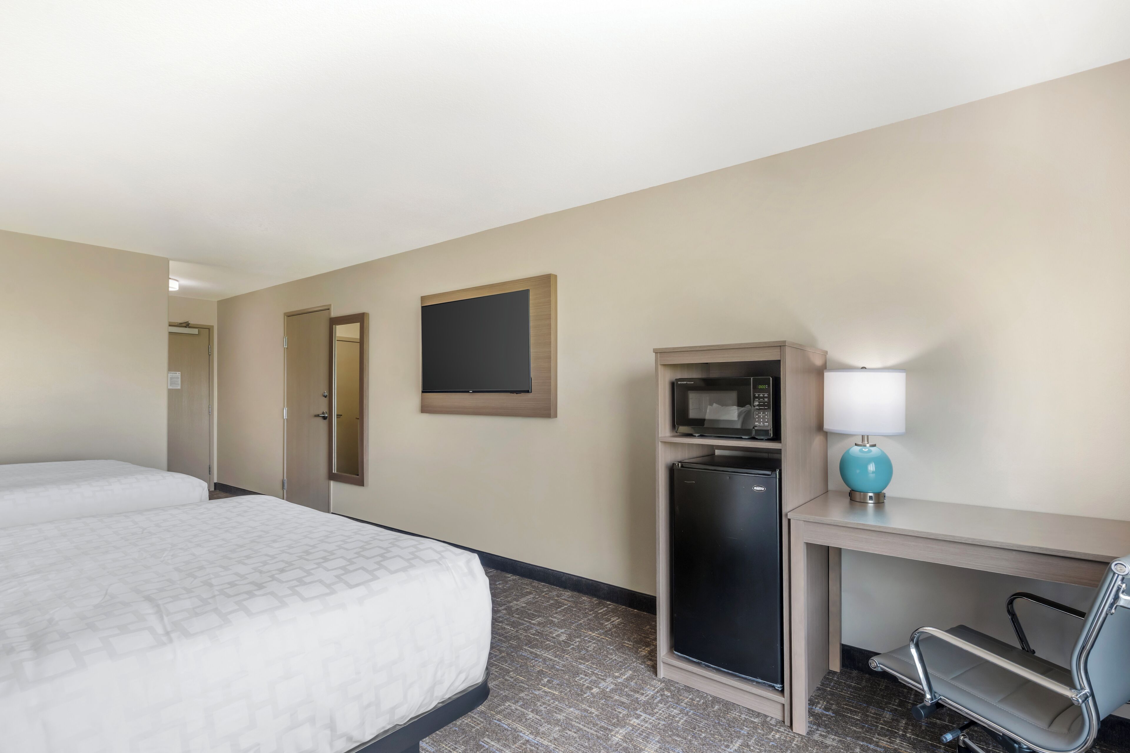 desk, blackout curtains, iron/ironing board, free cots/infant beds