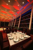 Breakfast, lunch, dinner served; international cuisine, alfresco dining 