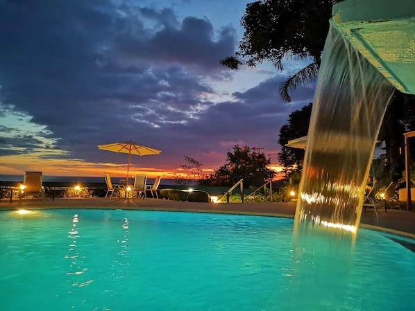 2 outdoor pools, open 10:00 AM to 7:00 PM, pool umbrellas, pool loungers