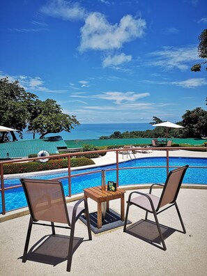 2 outdoor pools, open 10:00 AM to 7:00 PM, pool umbrellas, sun loungers