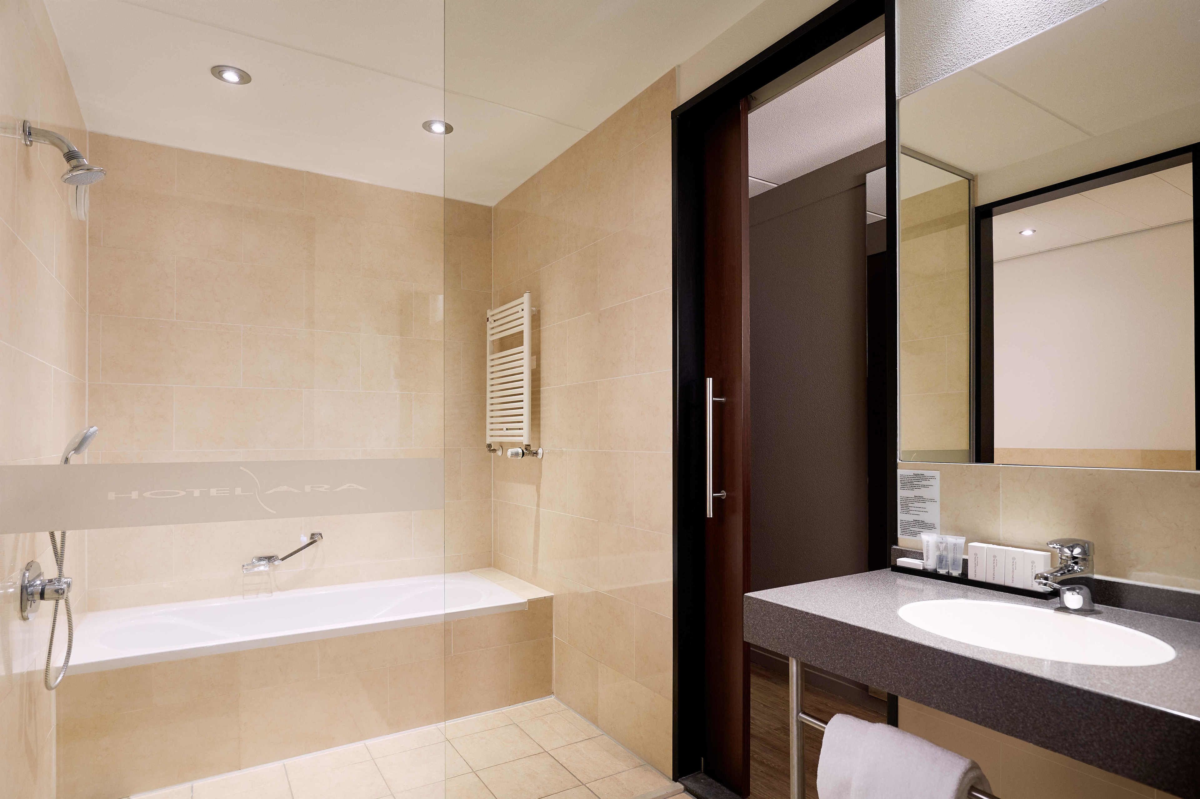 separate bathtub and shower, deep-soaking bathtub, free toiletries