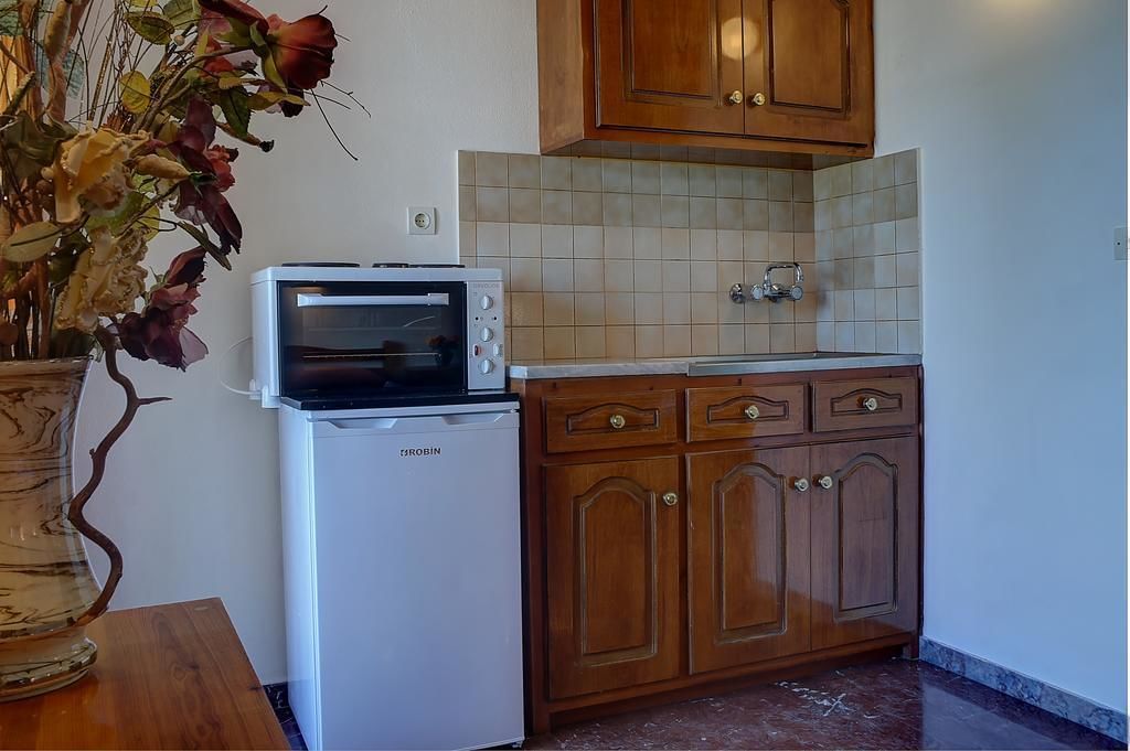 family studio, 1 bedroom, balcony, partial sea view | 1 bedroom, minibar, desk, free wifi