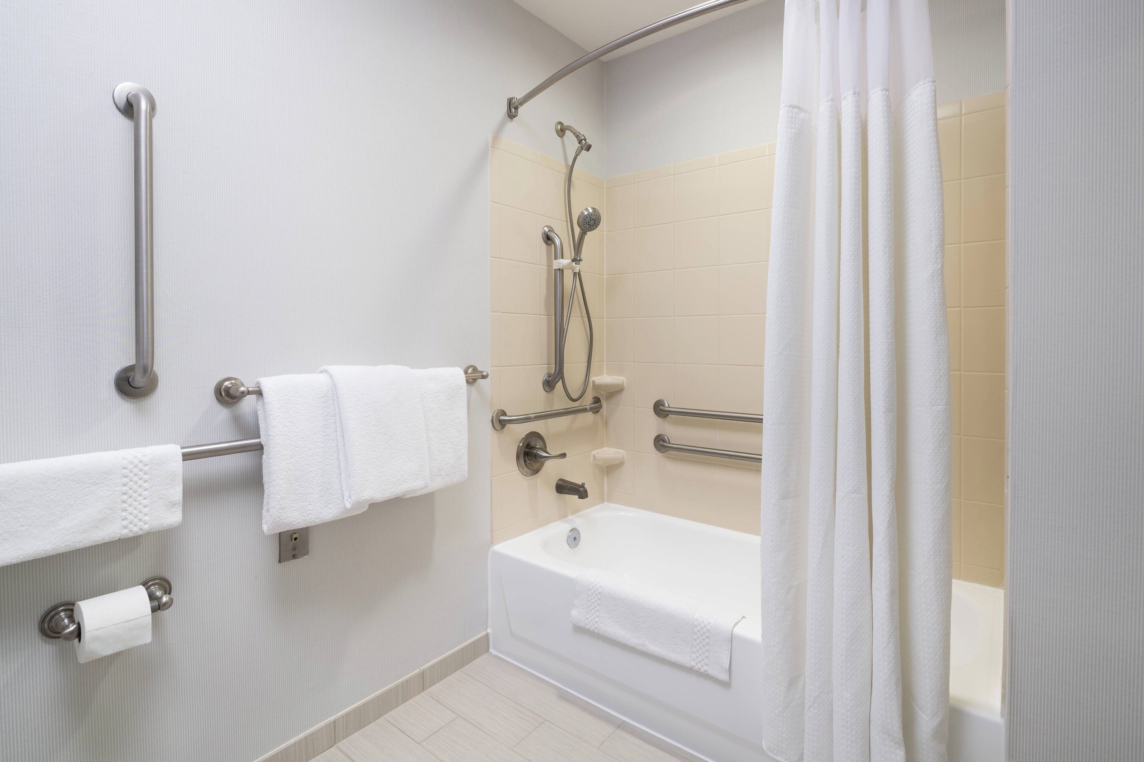 room, 2 queen beds | bathroom | combined shower/bathtub, hair dryer, towels