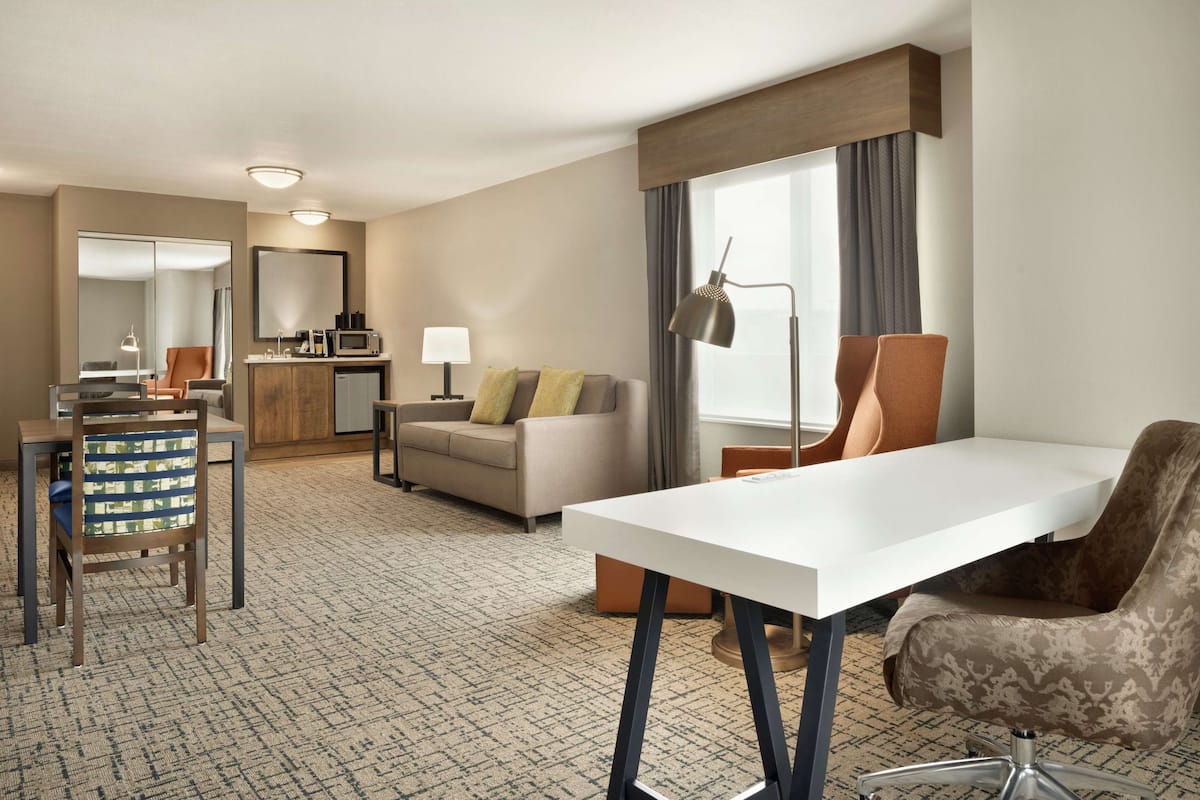 Suite | Desk, laptop workspace, iron/ironing board, cribs/infant beds
