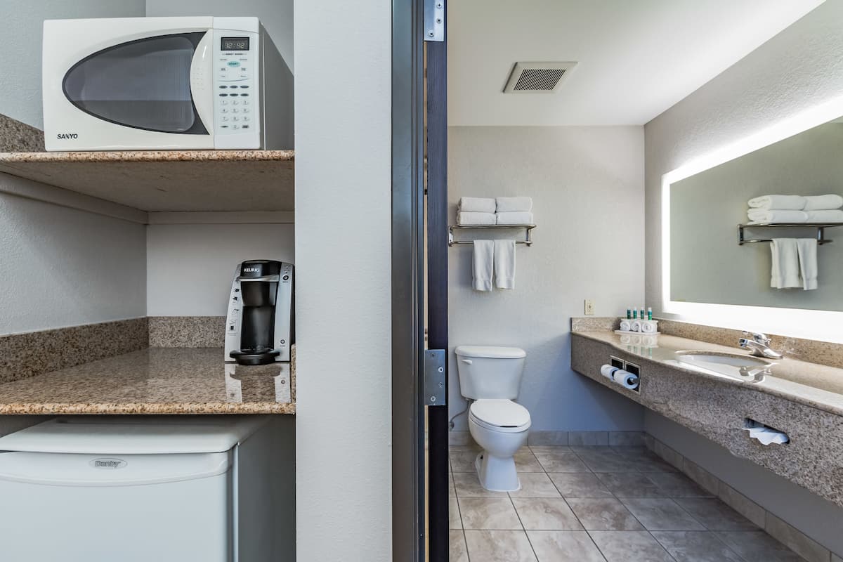 suite, 2 queen beds | 1 bedroom, hypo-allergenic bedding, in-room safe, desk