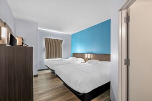 Habitación estándar, 2 camas de matrimonio, no fumadores | Escritorio, wifi gratis, ropa de cama