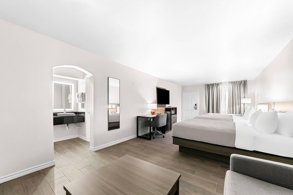 Suite, Multiple Beds, Non Smoking | Blackout drapes, WiFi (free), bed sheets