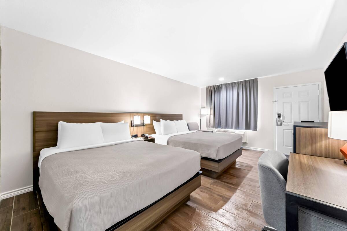 Standard Room, 2 Queen Beds, Smoking | Blackout drapes, free WiFi, bed sheets, wheelchair access